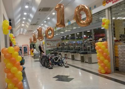 Allestimento centro commerciale negozi palloncini decorazioni inaugurazione festa